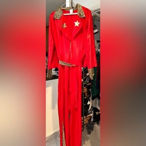 Red rocker jumpsuit costume with gold tone stars and trim (one size )